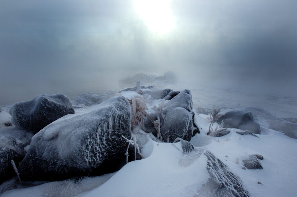 Frozen rocks and snow on the shores of Lake Superior